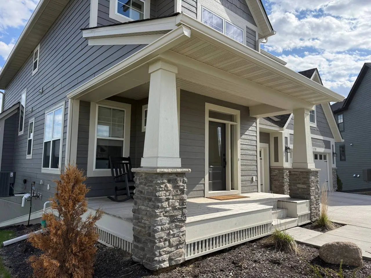 Seamless gutter installation on a residential home in Delano MN